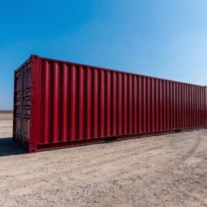 New one-trip 40ft standard shipping container in an open industrial yard