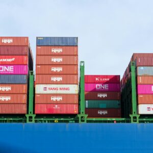 Colourful stacked shipping containers on a freighter
